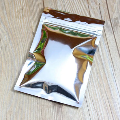 100 шт. плоских глянцевых серебристых алюминиевых фольгированных пакетов с застежкой-молнией, идеально подходящих для хранения чая, закусок, специй и кофе, многоразовые упаковочные пакеты 