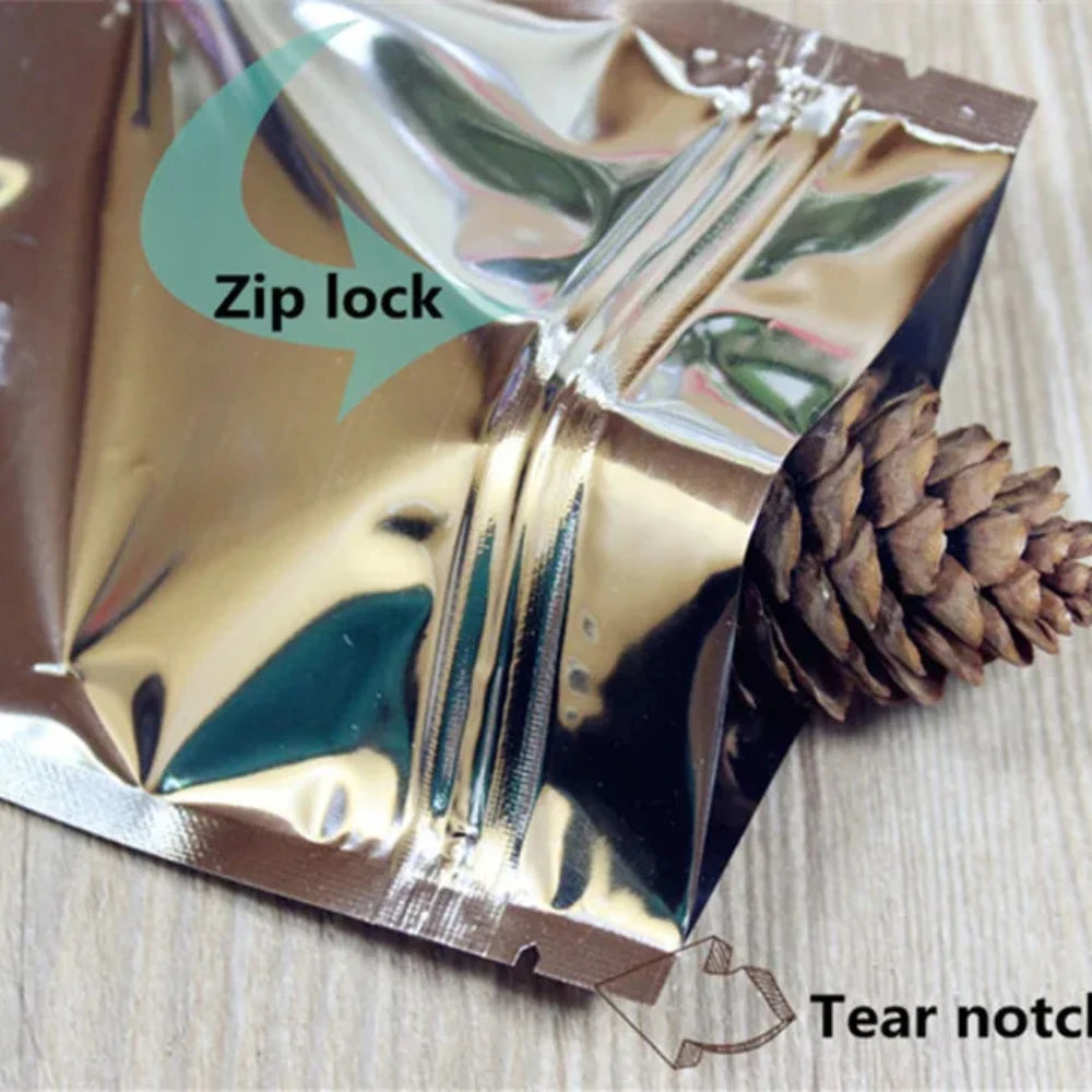 100 шт. плоских глянцевых серебристых алюминиевых фольгированных пакетов с застежкой-молнией, идеально подходящих для хранения чая, закусок, специй и кофе, многоразовые упаковочные пакеты 